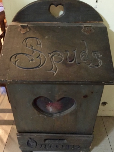 I believe this potato-and-onion bin is older than I am.